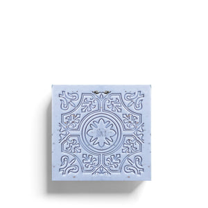 An open ROSE ET MARIUS - LAVENDER SCENTED SOLID SOAP GIFT BOX reveals a matching decorative soap, both adorned with elegant, light blue and white Provence-inspired motifs.