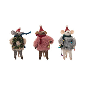 Three CREATIVE COOP handmade felt mouse ornaments, including one in a faux fur sweater, wear Santa hats and stylish accents, with festive accessories and charming poses. Product: HANDMADE FELT MOUSE WITH FAUX FUR SWEATER.