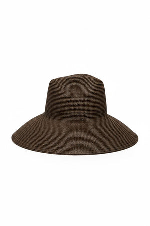The WYETH Lina Raffia Sun Hat in Chocolate features a packable, ultra wide brim and slightly pointed crown, shown against a plain white background.