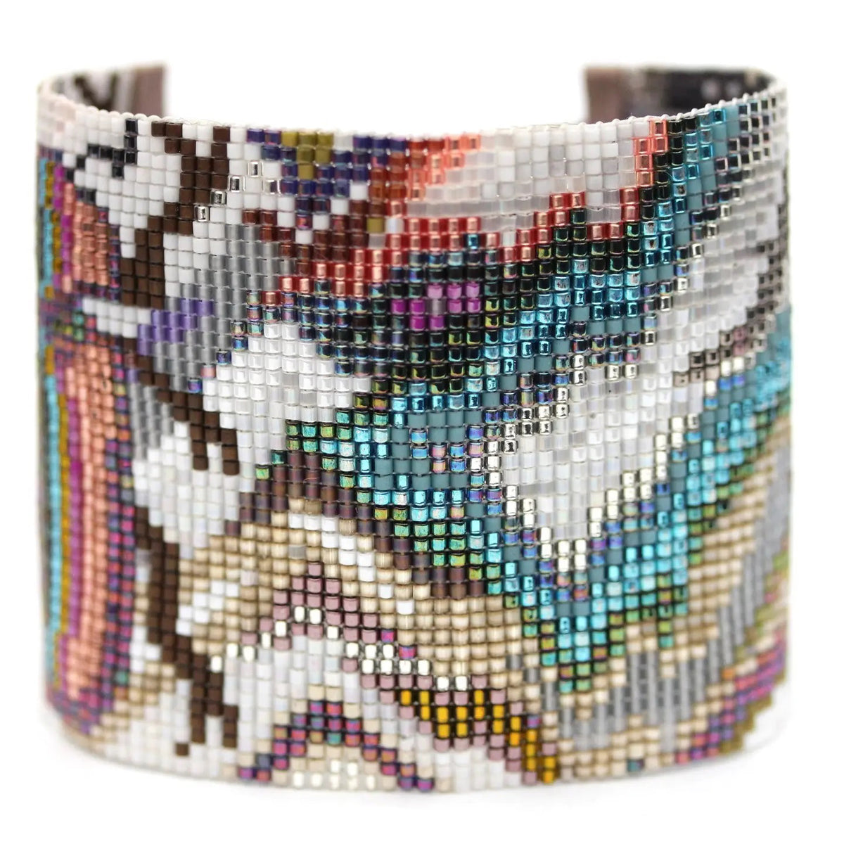 The JULIE ROFMAN - TAHITI CUFF by JULIE ROFMAN JEWELRY is a handwoven bracelet featuring multicolored beads in an abstract pattern. It showcases vibrant hues of blue, pink, gold, black, and white. The intricate design is crafted from small square beads and colorful agates, giving it a beautifully textured and artistic appearance.