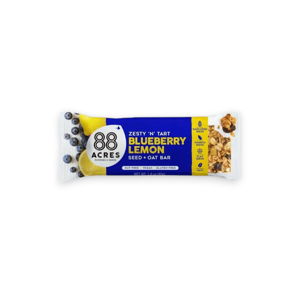 A zesty &#39;N&#39; tart 88 ACRES - BLUEBERRY LEMON SEED OAT BAR is displayed against a light wooden surface. The blue and white packaging showcases images of blueberries and lemon. This bar from 88 ACRES is nut-free, vegan, gluten-free, and made with sunflower seeds.