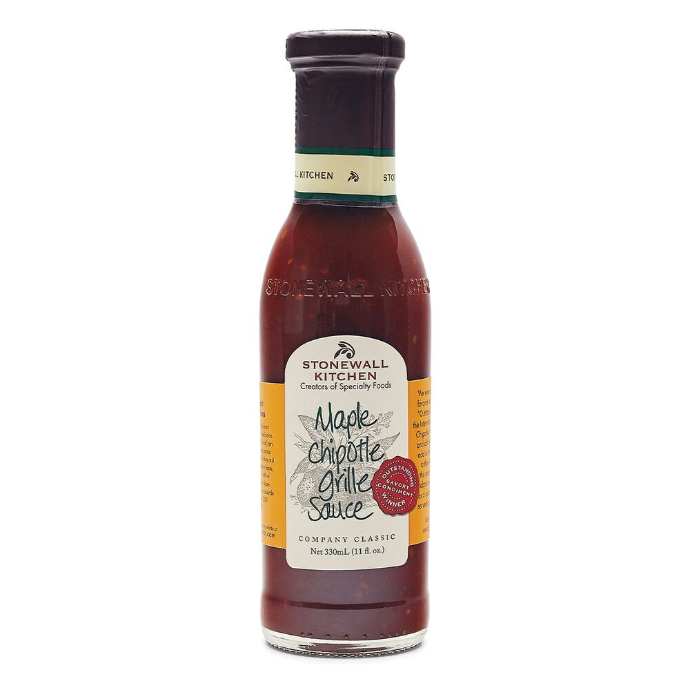 A glass bottle of STONEWALL KITCHEN- MAPLE CHIPOTLE GRILLE SAUCE, featuring a green cap and a cream-colored label with STONEWALL KITCHEN branding and product details—this flavorful sauce is ideal for grilling or as a delicious barbecue accompaniment.