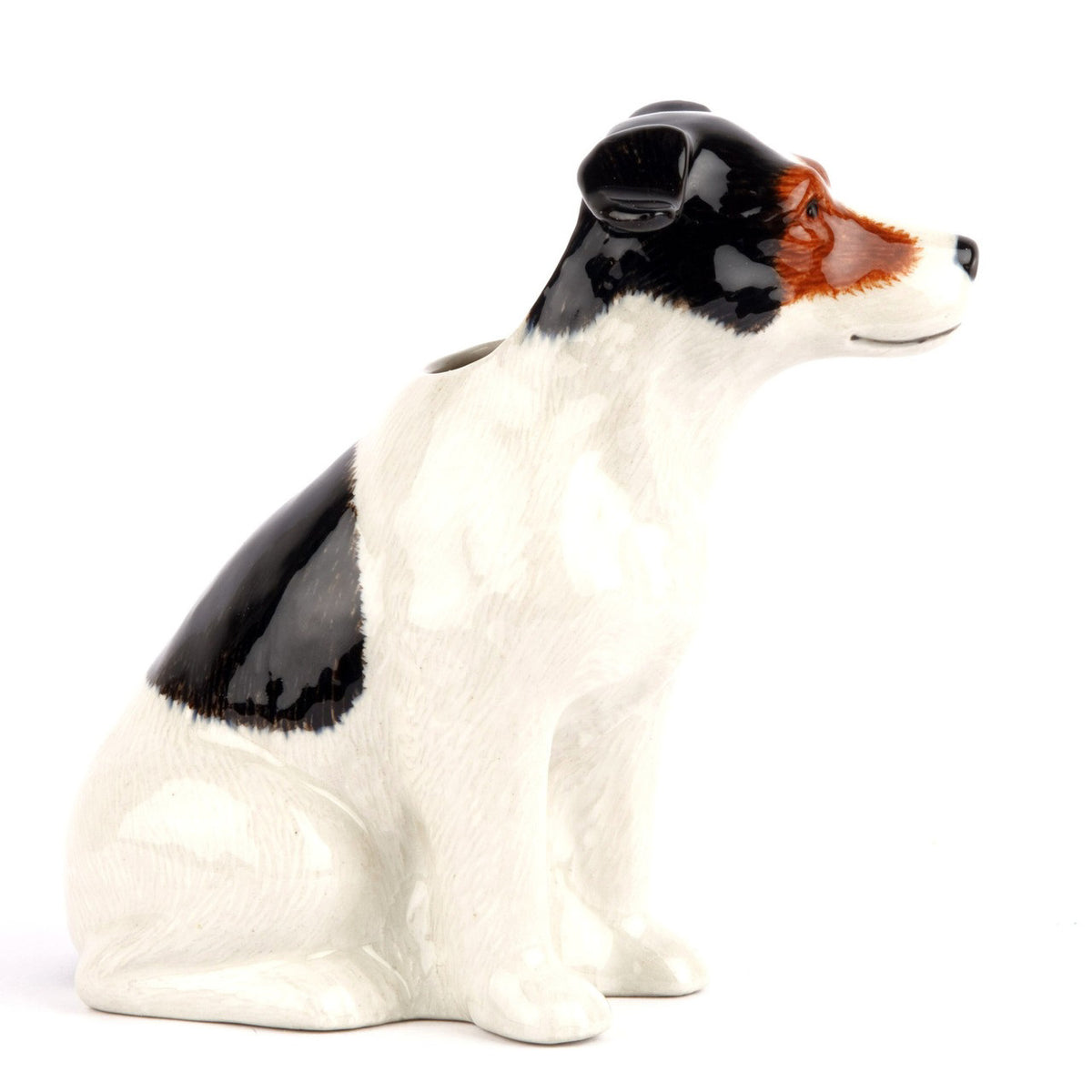 The QUAIL CERAMICS - JACK RUSSELL FLOWER VASE SMALL by QUAIL DESIGNS features a hand-painted stoneware dog with black ears, a white body, and brown eye patches, sitting upright against a plain white background.