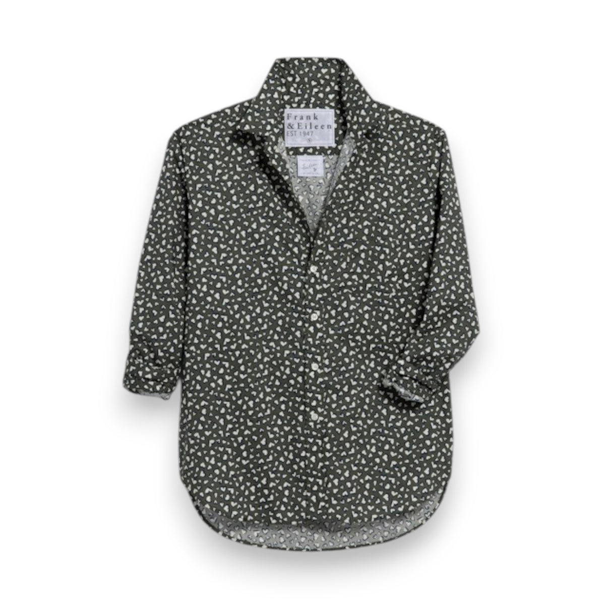 The FRANK &amp; EILEEN EILEEN Relaxed Button Up Shirt in Italian Cotton Messy Hearts features a black background with a small white floral print, long sleeves partially rolled, and an open collar, displayed flat for showcase.