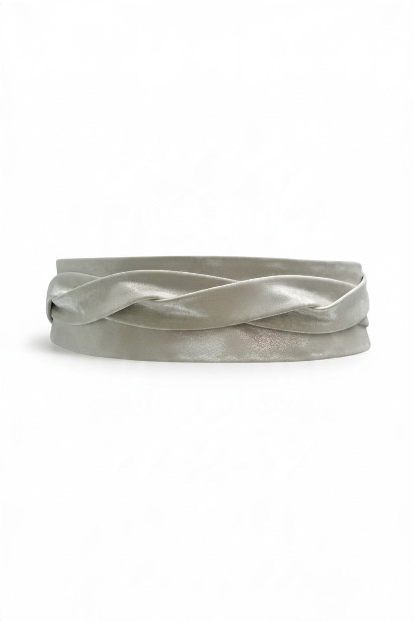 ADA Leather Wrap Belt in Silver Shimmer, featuring a metallic silver finish and a twisted center detail.