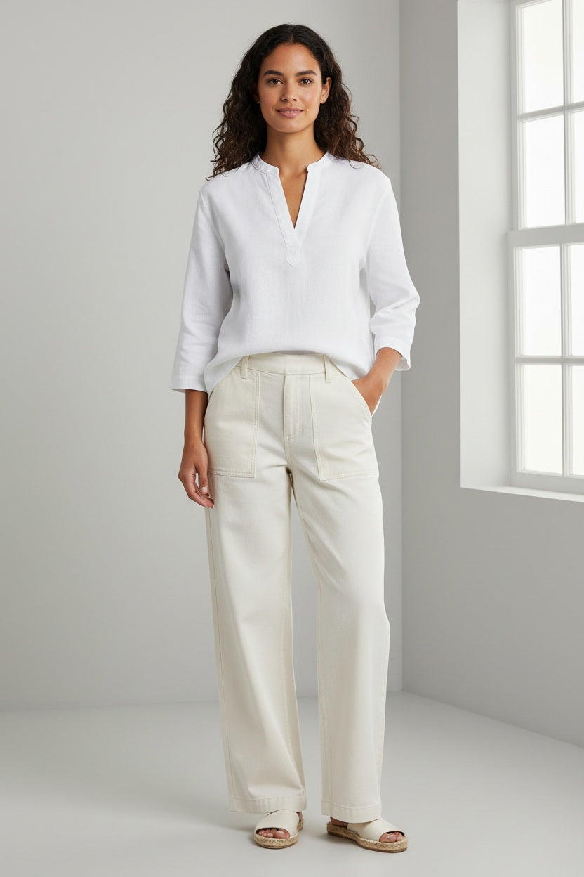 The FRANK &amp; EILEEN Gabi Popover Shirt in Famous Denim White features a loose fit, long sleeves, a deep V neckline, and a collared design—ideal for layering over your favorite denim looks.