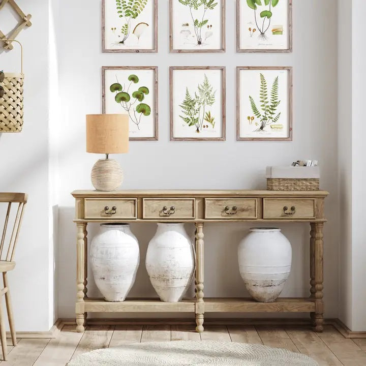 The NAPA HOME AND GARDEN - MADDIE TABLE LAMP features a round, ribbed ceramic base in light beige and a textured brown natural linen shade, adding simple modern style to any room.
