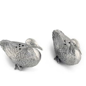 VAGABOND HOUSE's Pewter Duck Salt and Pepper Set showcases two ducks with detailed feather engravings, sitting slightly forward with dispensing holes on their backs.