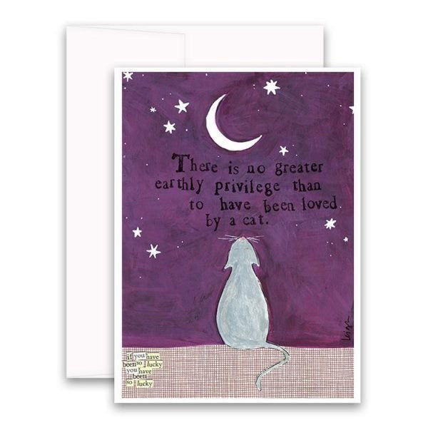 The CURLY GIRL DESIGNS - LOVED BY A CAT CARD by CURLY GIRL DESIGN, INC features charming collage art of a gray cat gazing up at a purple night sky filled with stars and a crescent moon. The text on the card reads, "There is no greater earthly privilege than to have been loved by a cat." A smaller caption at the bottom says, "And if you have been so lucky, treasure it.