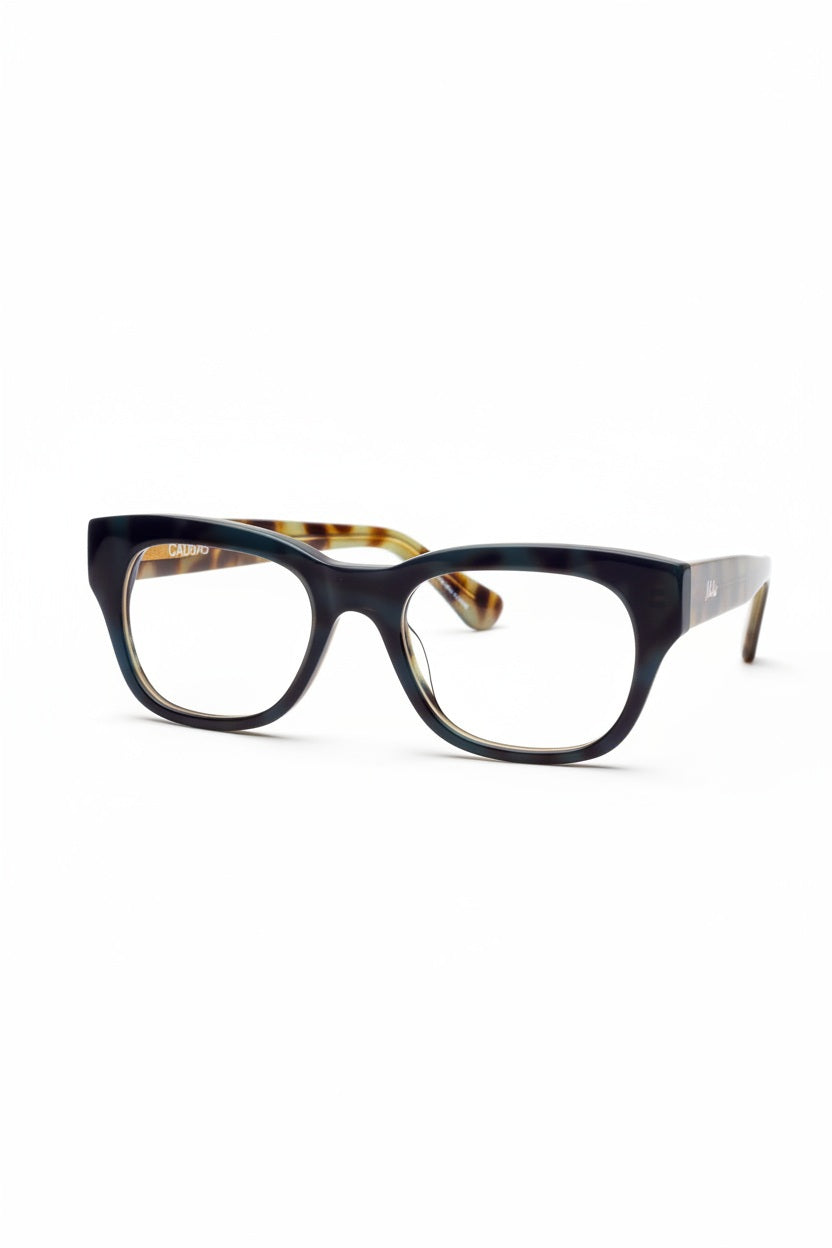 CADDIS - MIKLOS PROGRESSIVE READERS IN CONTRABAND by CADDIS, featuring thick black rectangular frames with durable scratch-resistant lenses and tortoiseshell-patterned temple arms, displayed on a white background.