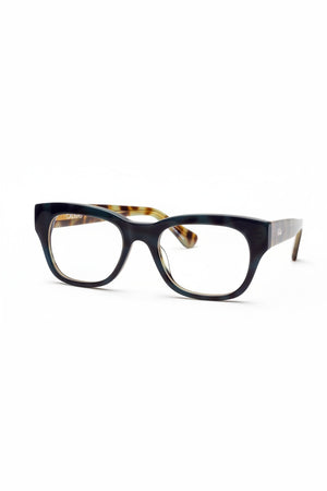 CADDIS - MIKLOS PROGRESSIVE READERS IN CONTRABAND by CADDIS, featuring thick black rectangular frames with durable scratch-resistant lenses and tortoiseshell-patterned temple arms, displayed on a white background.