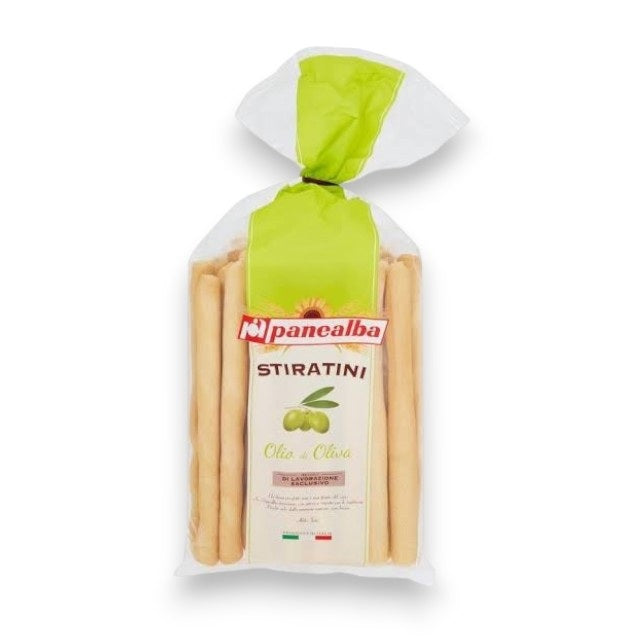 A clear bag of GRISSINI DEL VECCHIO PALONE - BREADSTICKS from INTERNATIONAL GOURMET FOODS, featuring green and white packaging with a label inspired by the colors of the Italian flag—ideal for serving alongside charcuterie or savoring as authentic rustic breadsticks on their own.