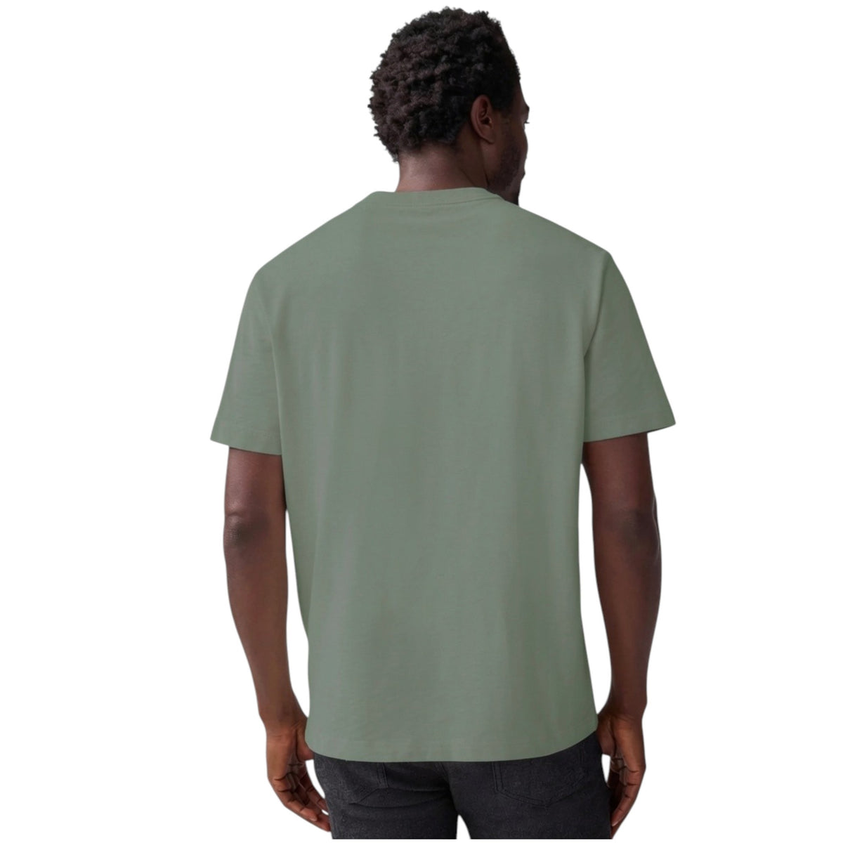 A person wears the MACK WELDON Heavyweight Slub Cotton Pocket T-Shirt in Cactus, a light olive green relaxed fit short-sleeve tee with a chest pocket, shown cropped to the upper torso against a plain white background.