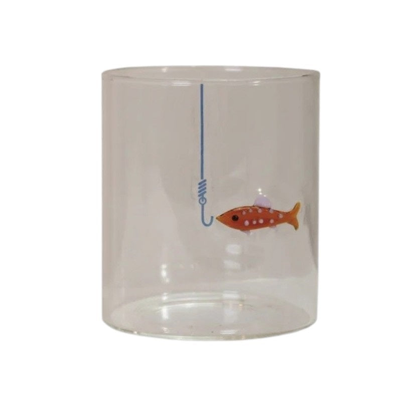 Set of three CREATIVE COOP HAND-BLOWN DRINKING GLASS WITH FISH ON HOOK, each with a unique green, blue, or red fish design—perfect for adding a playful accent to any coastal décor.