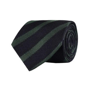 The AMANDA CHRISTENSEN Striped Jacquard Woven Silk Tie in Green showcases refined Italian craftsmanship with diagonal black and dark green stripes on a crisp white background, making it a sophisticated accessory that enhances any gentleman’s wardrobe.
