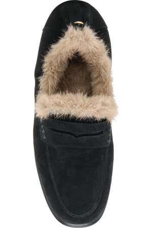 DOLCE VITA - CLOEY PLUSH LOAFERS IN ONYX SUEDE: black suede penny loafer with a collapsible heel and tan faux shearling lining.