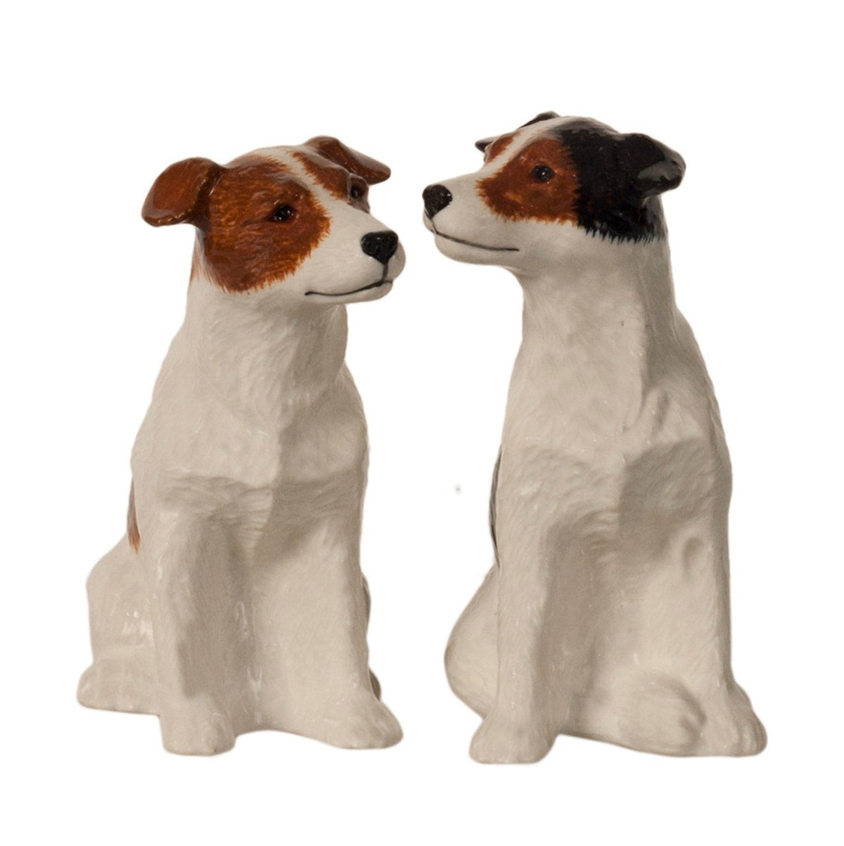 The QUAIL DESIGNS QUAIL CERAMICS Jack Russel Salt and Pepper Set features two handpainted stoneware figurines with brown and black markings, lifelike details, and alert expressions—an adorable addition to any table.