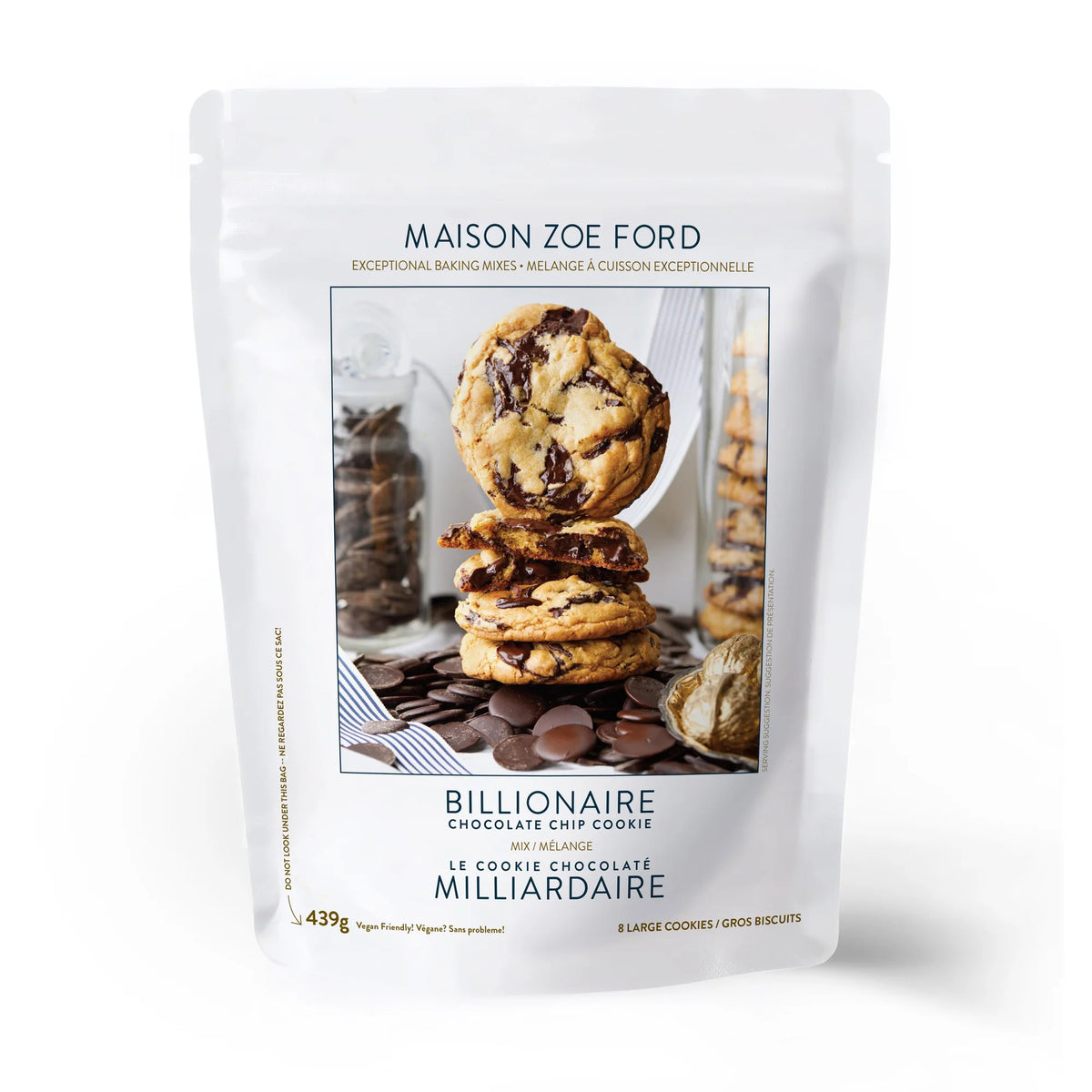 A white pouch of MAISON ZOE FORD BILLIONAIRE CHOCOLATE CHIP COOKIE Mix, showing stacked chocolate cookies with chocolate pieces and baking ingredients, promises an easy, bakery-quality cookie experience from MAISON ZOE FORD.