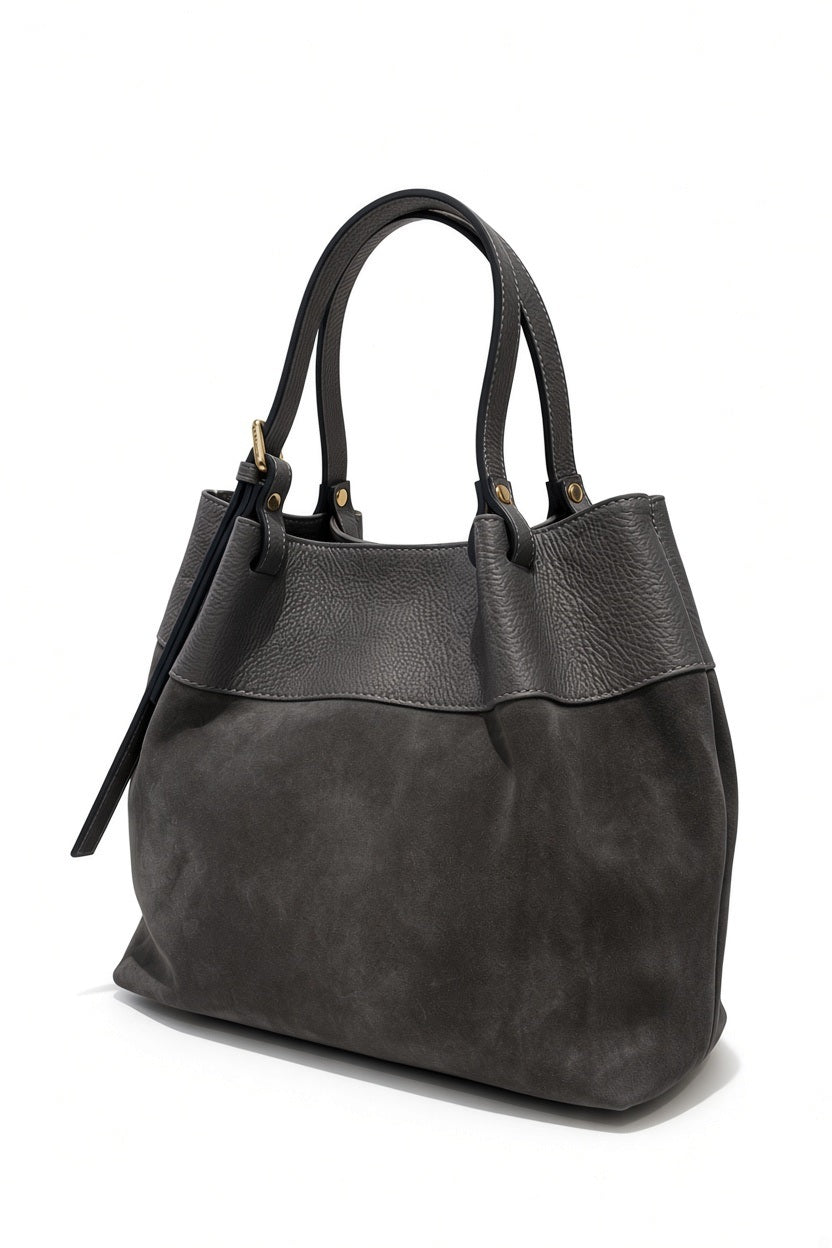 LE BORSETTE LEATHER AND SUEDE TOTE HANDBAG in dark gray suede with a pebbled leather top panel, featuring two shoulder straps, gold-toned hardware, and the refined texture of a genuine leather purse.