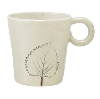 Four white HAND-PAINTED STONEWARE MUGS WITH BOTANICAL DESIGN from CREATIVE COOP are lined up side by side, each featuring unique flower and leaf illustrations and a comfortable round handle to brighten your morning routine.