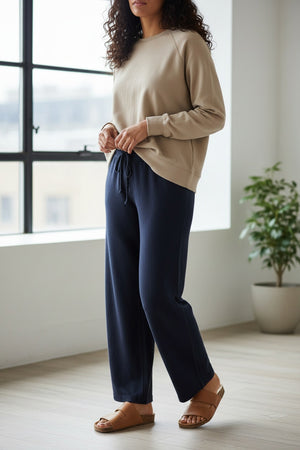 FRANK & EILEEN's CATHERINE 29" Full Length Sweatpant in British Royal Navy features a high-rise, wide-leg silhouette, elastic waistband with drawstring, and garment-dyed finish for a rich look. Shown flat on a white background.