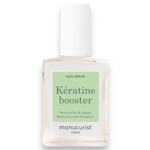 A transparent glass bottle of MANUCURIST - KERATIN BOOSTER by MANUCURIST INC, featuring a white cap and green label, described as a restructuring nail strengthener designed to repair and enhance nail care.