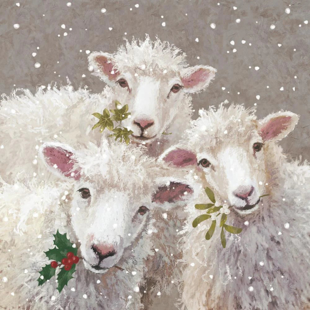 Brighten your holiday table with PAPER PRODUCTS DESIGN - PETER, PAUL &amp; MARY BEVERAGE NAPKINS featuring three fluffy white sheep with festive greenery in falling snow—cheerful, chlorine-free napkins by PAPER PRODUCTS DESIGN.