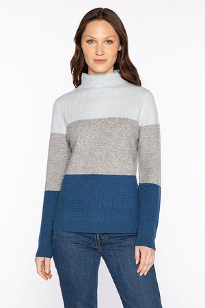 The KINROSS CASHMERE Textured Colorblock Funnel Neck Sweater by KINROSS features a luxurious knit, long sleeves, and a high neck in cream, gray, and light brown tones, shown on a white background.