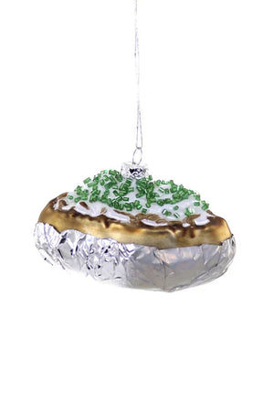 A BAKED POTATO ORNAMENT shaped like a loaded baked potato topped with sour cream and chives, wrapped in foil.