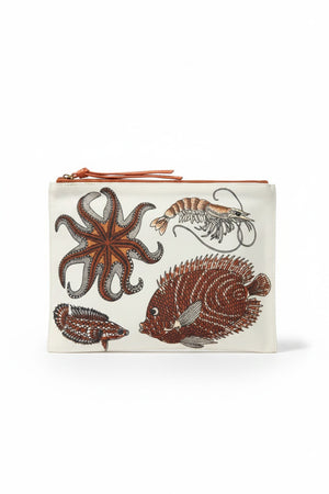 The INOUI EDITIONS Poseidon Pouch is a rectangular white bag by INOUI, made from durable cotton canvas with an orange zipper and decorated with colorful marine motifs like starfish, shrimp, pufferfish, and lionfish.