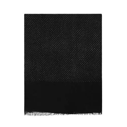 The AMANDA CHRISTENSEN - JACQUARD WOVEN LINEN SCARF IN BLACK features a subtle dotted jacquard texture on the upper portion and transitions to solid black with a short fringe along the bottom edge. Displayed against a white background, this refined men’s accessory from AMANDA CHRISTENSEN offers sophisticated style.