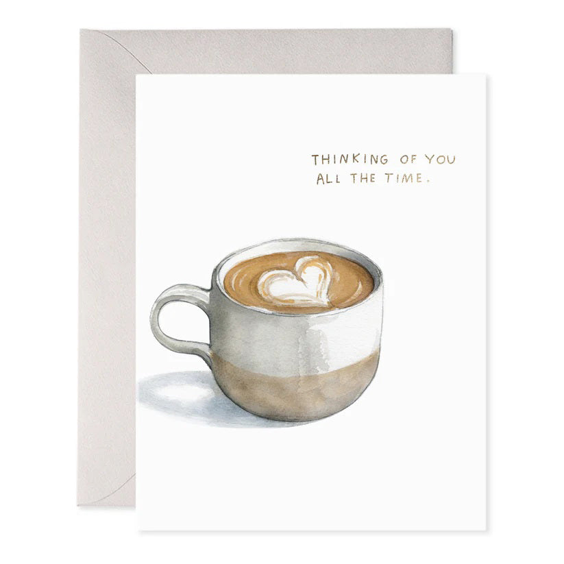 The E. FRANCES PAPER - ALL THE TIME GREETING CARD features a handcrafted watercolor coffee cup with heart latte art and elegant foil accents, reading "Thinking of you all the time." It includes an off-white envelope, perfect for conveying warmth and affection.