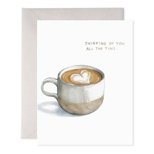 The E. FRANCES PAPER - ALL THE TIME GREETING CARD features a handcrafted watercolor coffee cup with heart latte art and elegant foil accents, reading "Thinking of you all the time." It includes an off-white envelope, perfect for conveying warmth and affection.