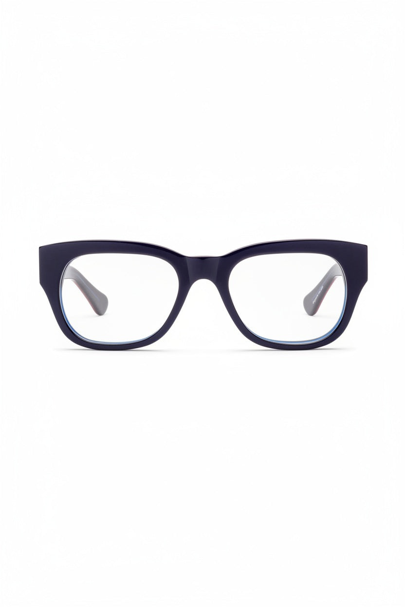 The CADDIS - MIKLOS PROGRESSIVE READERS by CADDIS, black thick-rimmed eyeglasses with durable scratch-resistant lenses, shown from the front against a white background.