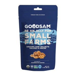 A blue package of GOODSAM FOODS' ORGANIC WALNUTS, RAW features images of a farmer, tractor, walnut pieces, and text supporting small farms and regenerative agriculture in northern California.