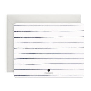 A set of 8 E. FRANCES PAPER "THANK YOU" flat notes features elegant watercolor designs with bold black lettering. Each card comes with an envelope, wrapped in a light green band labeled "E. Frances.