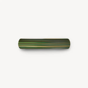 The MACHETE - NO. 3 Heirloom Barrette by MACHETE is a glossy, handmade cellulose acetate barrette with horizontal green, yellow, and brown stripes shown against a plain white background.