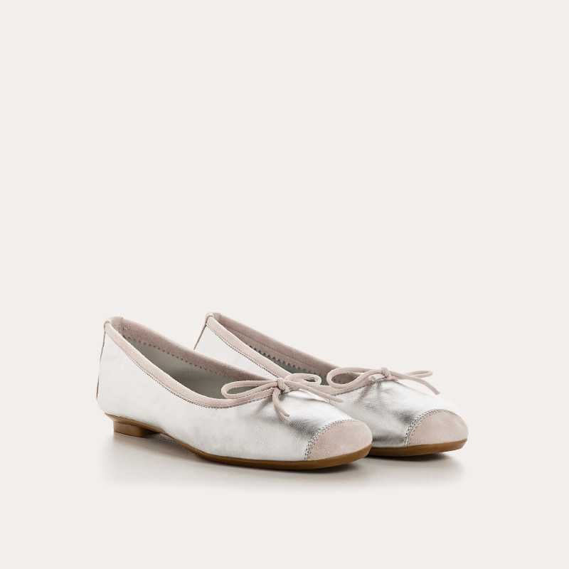 Top view of the REQINS - HARMONY BALLERINA FLATS IN METALIC SILVER by REQINS, featuring shimmering silver leather and a front bow, captured on a plain light background for a chic metallic look.