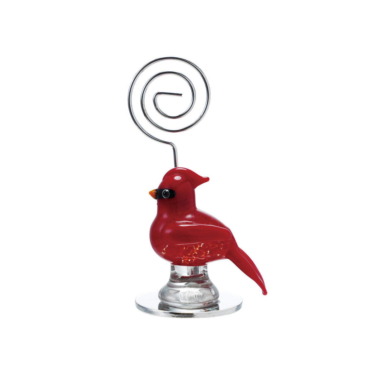 Two red name place cards, &quot;Sarah&quot; and &quot;Lisa,&quot; rest in festive holders—a snowman and the CREATIVE COOP CARDINAL GLASS PLACECARD HOLDER—on a light, marble-like surface.