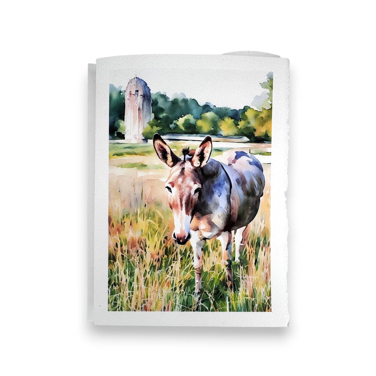 The FEARRINGTON SIGNATURE COLLECTION - WATERCOLOR GREETING CARD &quot;JASPER&quot; by PICTURE SALON features a watercolor donkey in tall grass with trees and a stone structure, perfect for textured paper greeting cards.