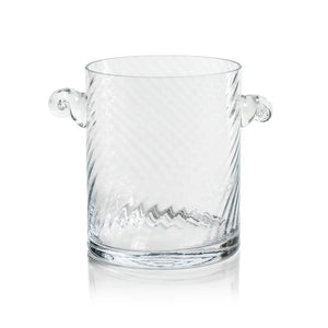 The BAGATELLE SWIRL GLASS ICE BUCKET by ZODAX features a clear, textured spiral design with diagonal swirls and two round handles—a modern bar accessory shown on a white background.