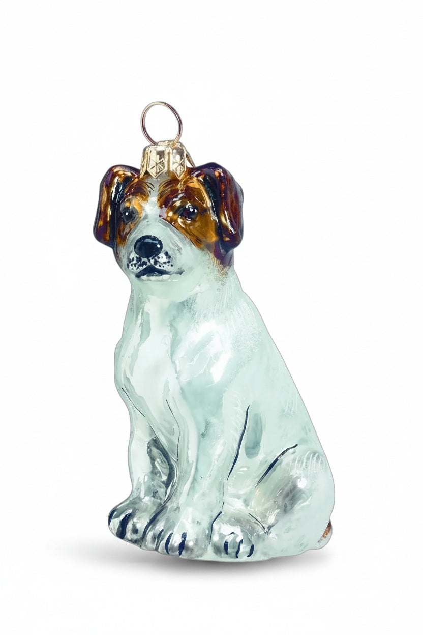 JOY TO THE WORLD COLLECTIBLES JACK RUSSSEL TERRIER ORNAMENT, a handmade glass sitting dog with brown and white coloring and a metal loop at the top for hanging.