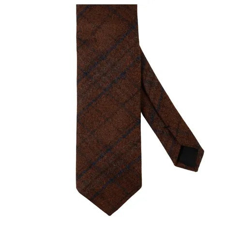 A rust-colored checked wool tie from Amanda Christensen, featuring a subtle checked pattern in varying shades of rust, shown on a white background.