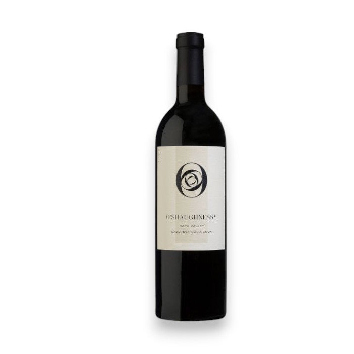 O'SHAUGHNESSY CABERNET 2021 by WINE: WINEBOW has a white label with a circular black logo and "Napa Valley Cabernet Sauvignon" text. Featuring the finest Howell Mountain grapes, it is set against a plain white background.