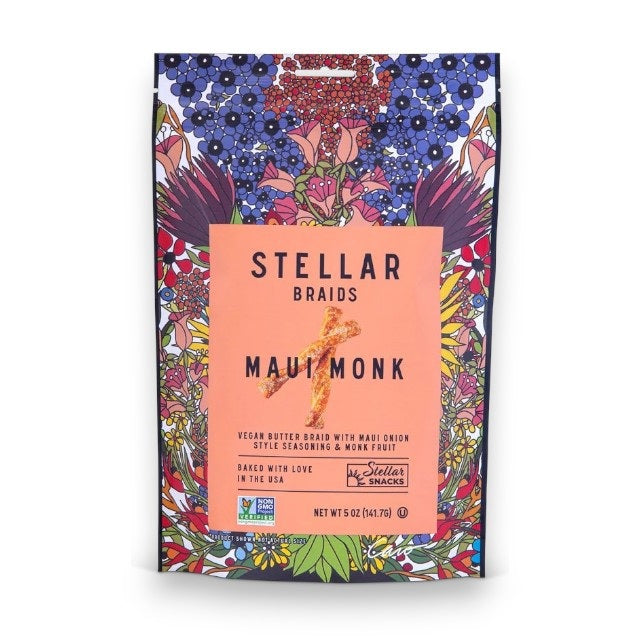 A vibrant 5oz bag of STELLAR SNACKS - MAUI MONK PRETZEL BRAIDS, adorned with lively floral artwork. The packaging showcases vegan butter braids seasoned with Maui onion and monk fruit, standing out as a delicious Non-GMO vegan snack. Experience the perfect crunch of these Maui onion pretzel braids, proudly made in the USA by STELLAR SNACKS.