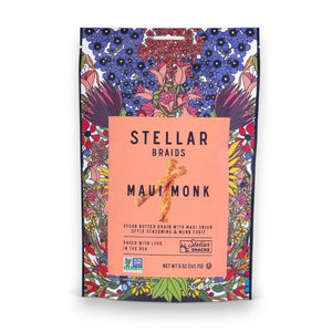 A vibrant 5oz bag of STELLAR SNACKS - MAUI MONK PRETZEL BRAIDS, adorned with lively floral artwork. The packaging showcases vegan butter braids seasoned with Maui onion and monk fruit, standing out as a delicious Non-GMO vegan snack. Experience the perfect crunch of these Maui onion pretzel braids, proudly made in the USA by STELLAR SNACKS.