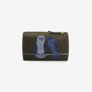 The INOUI EDITIONS - CHOUETTE COSMETIC POUCH IN KHAKI by INOUI is a khaki polyester pouch featuring embroidered designs of three blue owls and one blue cat sitting together on a branch, crafted in India.