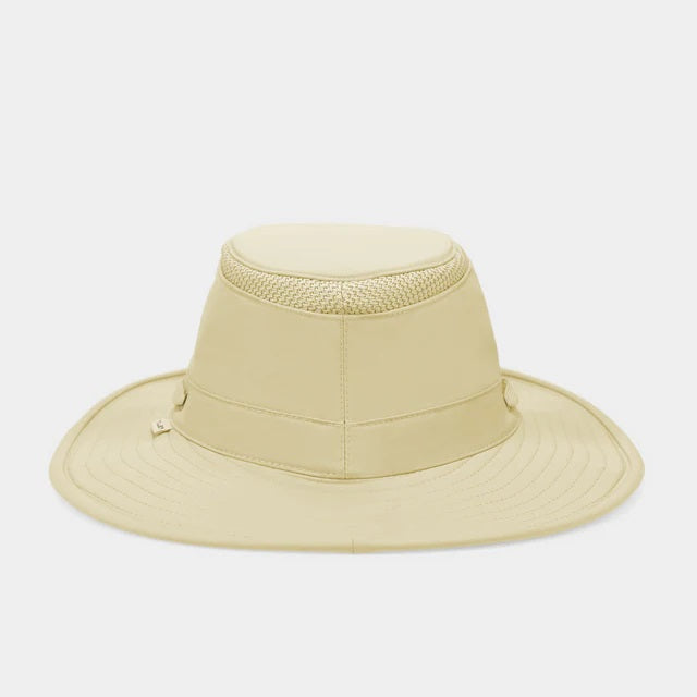 The TILLEY AIRFLO Broad Brim Hat LTM6 in Khaki Olive features mesh ventilation around the crown for outdoor use. Shown on a plain light background, this wide-brimmed sun protection hat is crafted by TILLEY.