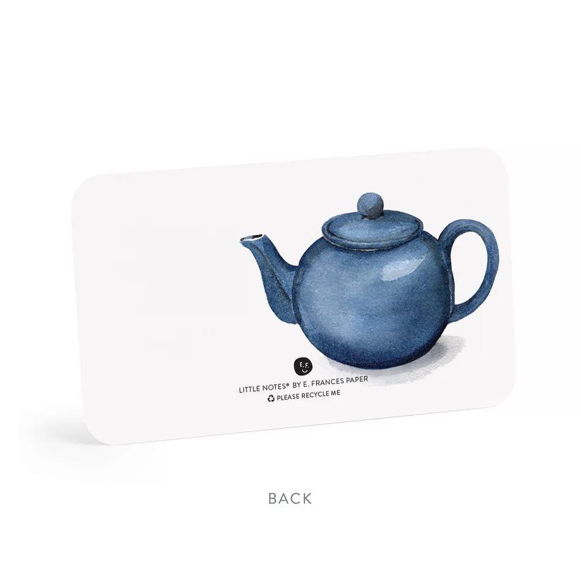 A clear plastic box contains 85 small notes, each featuring a watercolor illustration of a blue and white floral teacup on a saucer. The side label reads &quot;E. Frances Paper - Spot of Tea Little Notes® use unsparingly.