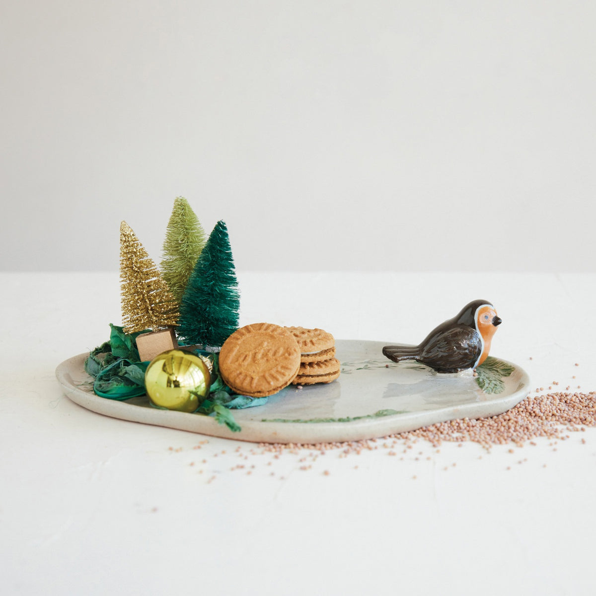 Creative Co-Op oval STONEWARE TRAY WITH 3D BIRD AND BIRD TRACKS, featuring a molded 3D bird figurine on the edge and patterned bird tracks across the surface.